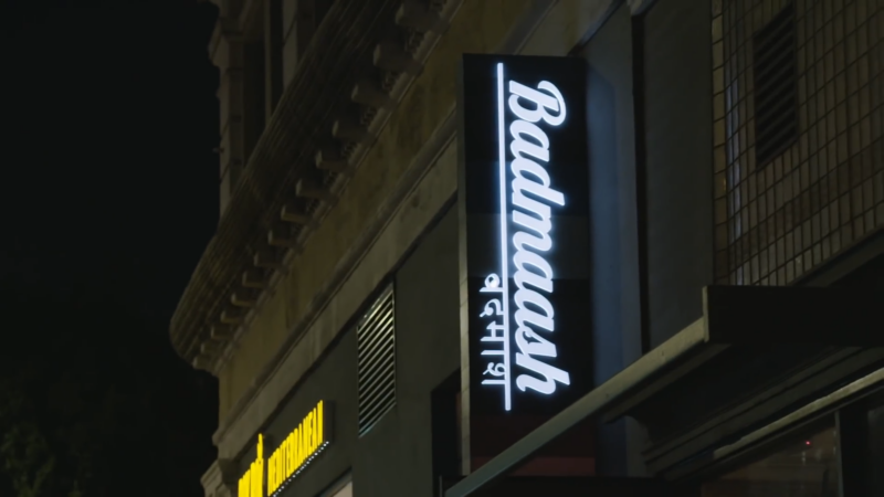 Illuminated Sign for Badmaash, a Modern Indian Restaurant in Downtown Los Angeles, Displayed on A Building at Night